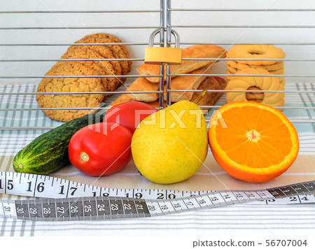 Cookies are in the cage locked with padlock. 56707004