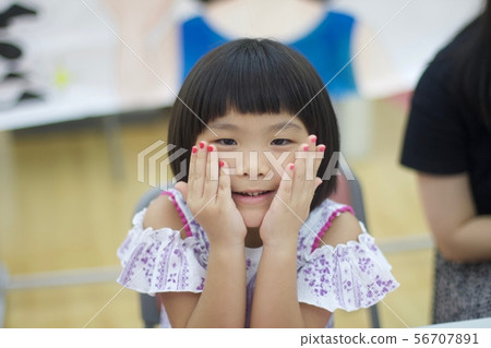 Girl with red nails 56707891