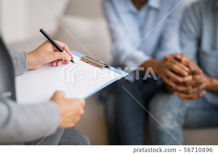 African American Spouses Holding Hands Visiting Marital Therapist African American Spouses Holding Hands Visiting Marital Therapist 56710896