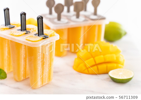 Fresh Mango popsicle Mango stick ice cream 56711309