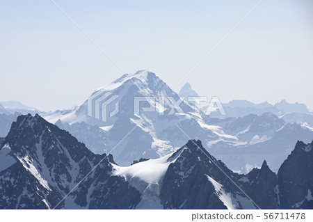 From the Aiguille du Midi observatory, the Grand Comban and the Matterhorn far away From the Aiguille du Midi observatory, the Grand Comban and the Matterhorn far away 56711478