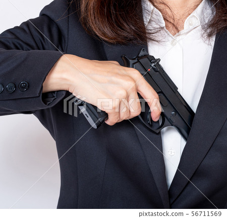A woman who puts out a gun A woman who puts out a gun 56711569