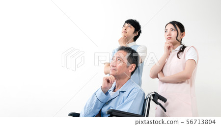Elderly person and caregiver thinking 56713804