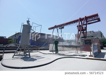 cleaning of the metal by sandblasting cleaning of the metal by sandblasting 56714523