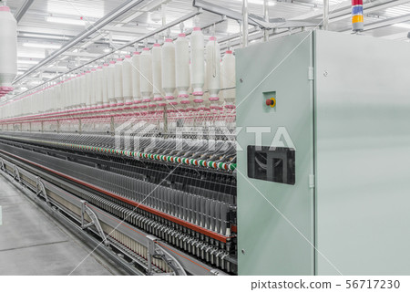 spools of thread at a textile factory 56717230
