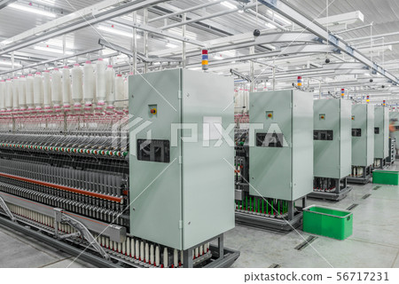 spools of thread at a textile factory 56717231