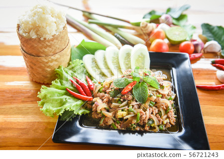 Spicy minced pork salad Thai food served on table 56721243