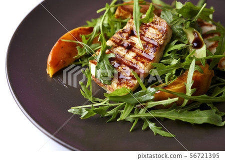 salad with halloumi and peaches 56721395
