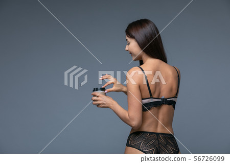Portrait Of A Lovely Asian Woman Take Away Coffee Cup 56726099