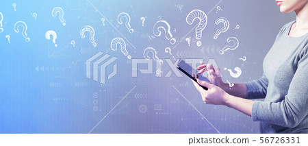 Question marks with woman using a tablet 56726331