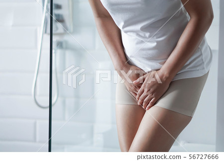 Close up woman stomachache with toilet 56727666