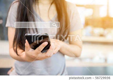 Woman use smartphones Woman use smartphones 56729936