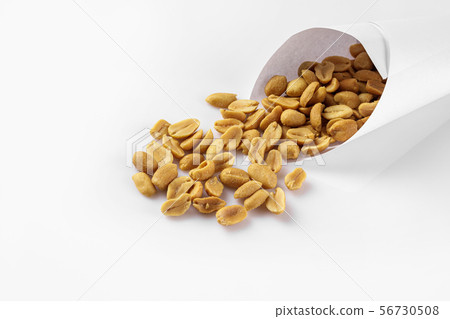 salted peanuts on white background. salted peanuts on white background. 56730508
