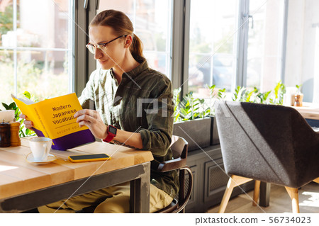 Nice good looking man studying words in Japanese 56734023