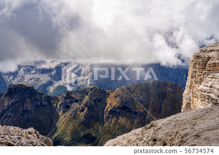 The Sass Pordoi is a relief of the Dolomites, in the Sella group, Italy The Sass Pordoi is a relief of the Dolomites, in the Sella group, Italy 56734574
