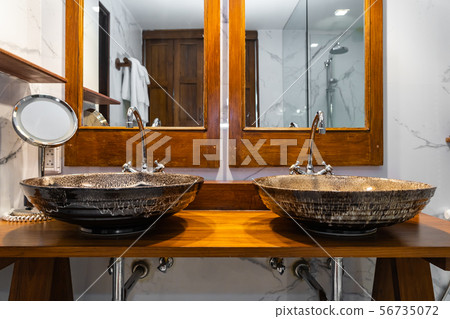 Beautiful decoration interior of sink and water faucet in bathroom 56735072