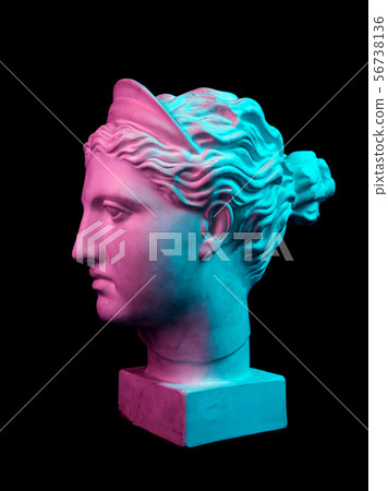 Gypsum copy of ancient statue Diana head isolated on black background. Plaster sculpture woman face. Gypsum copy of ancient statue Diana head isolated on black background. Plaster sculpture woman face. 56738136