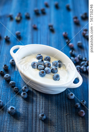 tasty blueberry fruits with cream 56738246