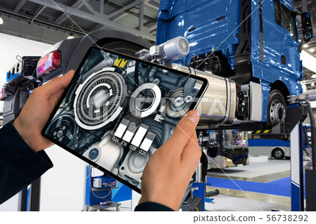 Serviceman repairing a truck  56738292