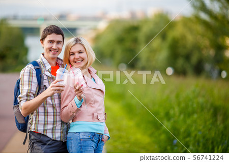 Photo of couple - man and woman with milkshakes 56741224