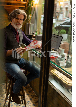 Handsome man thinking through his forthcoming journey. 56741537