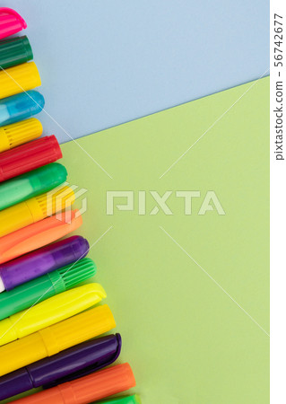 Back to school, minimalism concept. Felt-tip pens on pastel trendy blue green yellow color paper 56742677