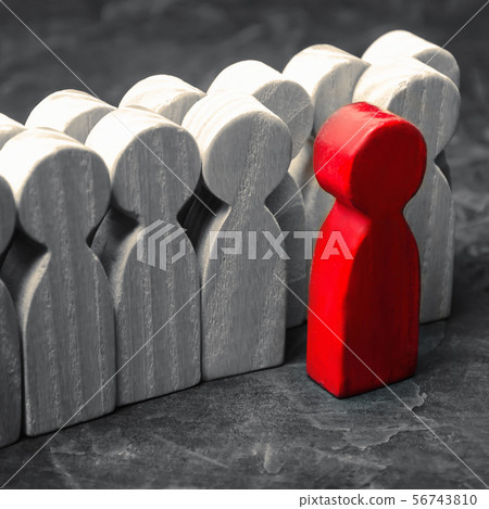 Wooden figures of people. The red man  56743810