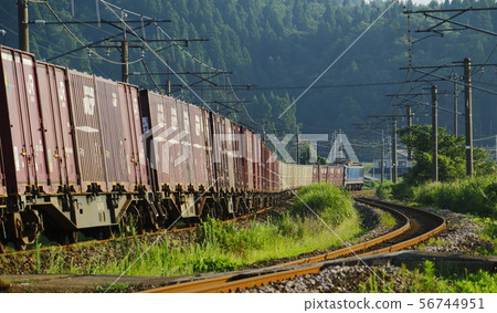 Container cargo heading north in the morning sun Container cargo heading north in the morning sun 56744951