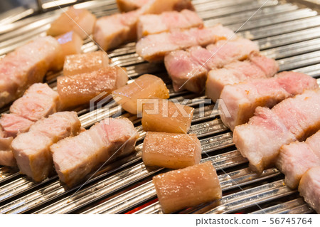 Pork belly on the grill 56745764