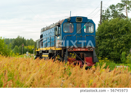 shunting locomotive on a railway line among the shunting locomotive on a railway line among the 56745973