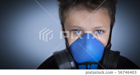 Young boy wearing gasmask, respirator portrait Young boy wearing gasmask, respirator portrait 56746403