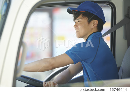 Male truck driver driving 56746444