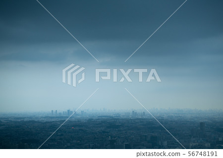 Tokyo cityscape in Japan overlooking dark clouds over Tokyo, Kawasaki, etc. 56748191