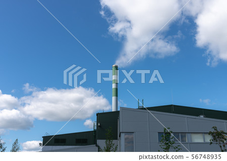 The pipe from which the smoke goes against the gra 56748935