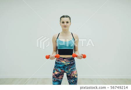 beautiful woman doing exercising beautiful woman doing exercising 56749214
