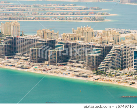 View on residential buildings on Palm Jumeirah island. The Palm Jumeirah is an artificial View on residential buildings on Palm Jumeirah island. The Palm Jumeirah is an artificial 56749710