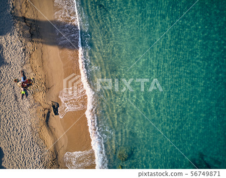 Beautiful beach with family top view shot 56749871