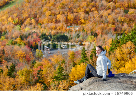 Woman hiking at Artist's Bluff in autumn Woman hiking at Artist's Bluff in autumn 56749966
