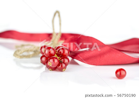 Fresh red currant isolated on white Fresh red currant isolated on white 56750190