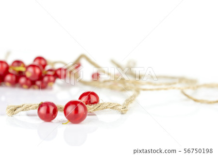 Fresh red currant isolated on white Fresh red currant isolated on white 56750198