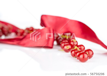 Fresh red currant isolated on white Fresh red currant isolated on white 56750206