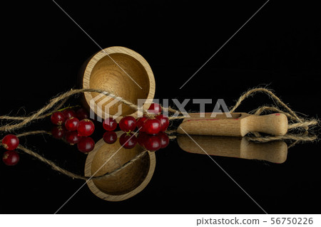 Fresh red currant isolated on black glass 56750226