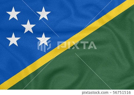 Flag of Solomon Islands on textured fabric. Flag of Solomon Islands on textured fabric. 56751516