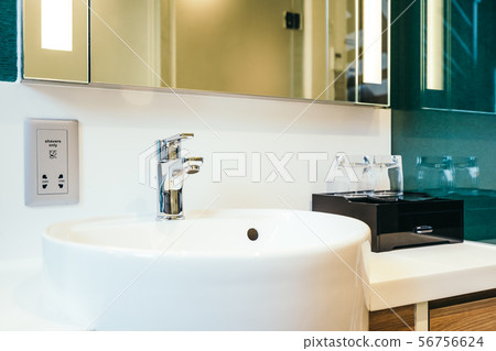 White sink and faucet decoration in bathroom White sink and faucet decoration in bathroom 56756624
