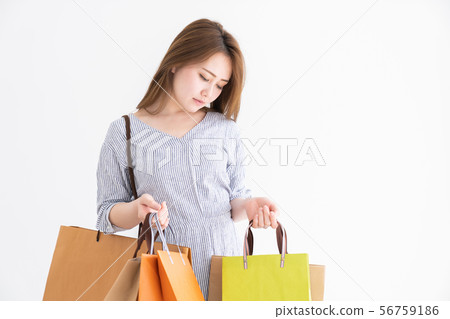 Woman shopping 56759186