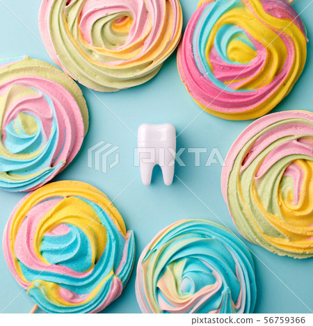 Plastic tooth in many colorfull rainbow sweetness Plastic tooth in many colorfull rainbow sweetness 56759366