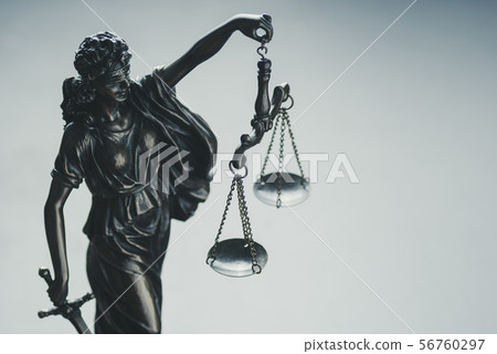 Metallic silver statue of Justice holding scales Metallic silver statue of Justice holding scales 56760297