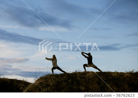 Young multiethnic international couple outdoors Young multiethnic international couple outdoors 56762623