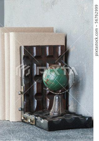 Antique book ends on a gray background Antique book ends on a gray background 56762999