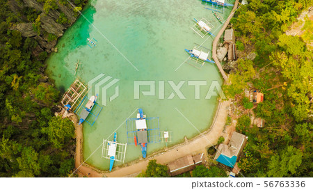 Very beautyful lagoon with boats. Paradise islands in Philippines. Kayangan Lake. Fisheye view. 56763336